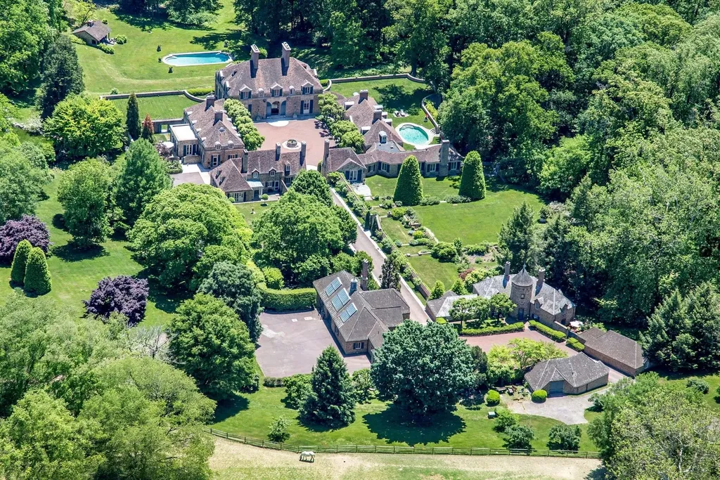 1543 Monk Road HOMESITE 1 Home in Gladwyne, Pennsylvania. Situated on 32.1 acres in the exclusive Philadelphia Main Line area, Linden Hill offers a unique opportunity to experience the epitome of estate living. This historic property, designed by renowned architect Edmund B. Gilchrist, showcases world-class architecture and a secluded, park-like setting. Impeccably maintained by its owners, the main residence and its dependencies exude timeless charm while incorporating 21st century amenities.