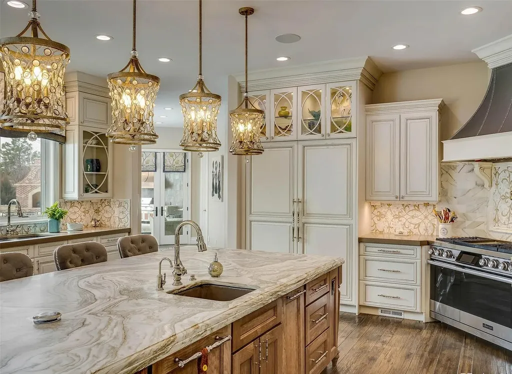 15490 Mountain View Circle Home in Broomfield, Colorado. Discover a one-of-a-kind contemporary custom home nestled on 2.34 acres, offering breathtaking mountain views and sleek designer elements. This thoughtfully designed lifestyle compound boasts unrivaled exclusivity, featuring a garage for 10 cars, a year-round saltwater pool, an outdoor kitchen, a finished basement with a shooting range and golf simulator, and much more. With impeccable construction and attention to detail, this turnkey home offers the epitome of luxurious living.