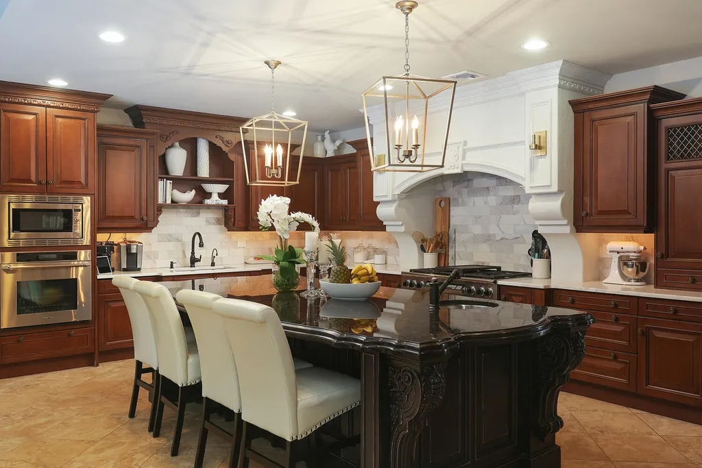 16 Tall Timber Lane Home in Bernards Township, New Jersey. Discover an extraordinary French Chateau-inspired property boasting nearly 12,000 sq ft of living space. This remarkable estate offers unparalleled luxury, featuring special amenities such as an elevator for easy accessibility, a first-floor guest suite, and radiant heated floors throughout, including the basement and garage. Indulge in the opulent 4,200 sq ft walk-out lower level, featuring high ceilings, a movie theater, expansive bar, gym, full spa bathroom with sauna, workshop, second laundry room, multiple entertainment areas, and potential for a sixth bedroom ensuite.