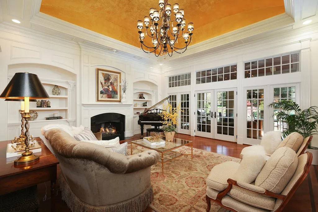16 Tall Timber Lane Home in Bernards Township, New Jersey. Discover an extraordinary French Chateau-inspired property boasting nearly 12,000 sq ft of living space. This remarkable estate offers unparalleled luxury, featuring special amenities such as an elevator for easy accessibility, a first-floor guest suite, and radiant heated floors throughout, including the basement and garage. Indulge in the opulent 4,200 sq ft walk-out lower level, featuring high ceilings, a movie theater, expansive bar, gym, full spa bathroom with sauna, workshop, second laundry room, multiple entertainment areas, and potential for a sixth bedroom ensuite.