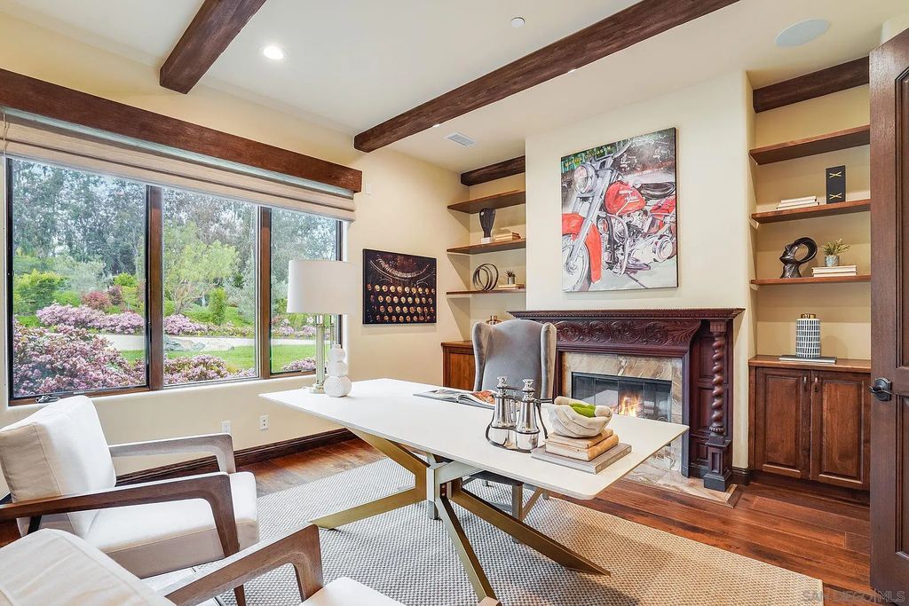 16109 Rambla De Las Flores Home in Rancho Santa Fe, California. The property is situated on 2.7 acres of land and features a detached guest house with a kitchen, as well as a master retreat with a private patio overlooking the pool, spa, and grounds. 