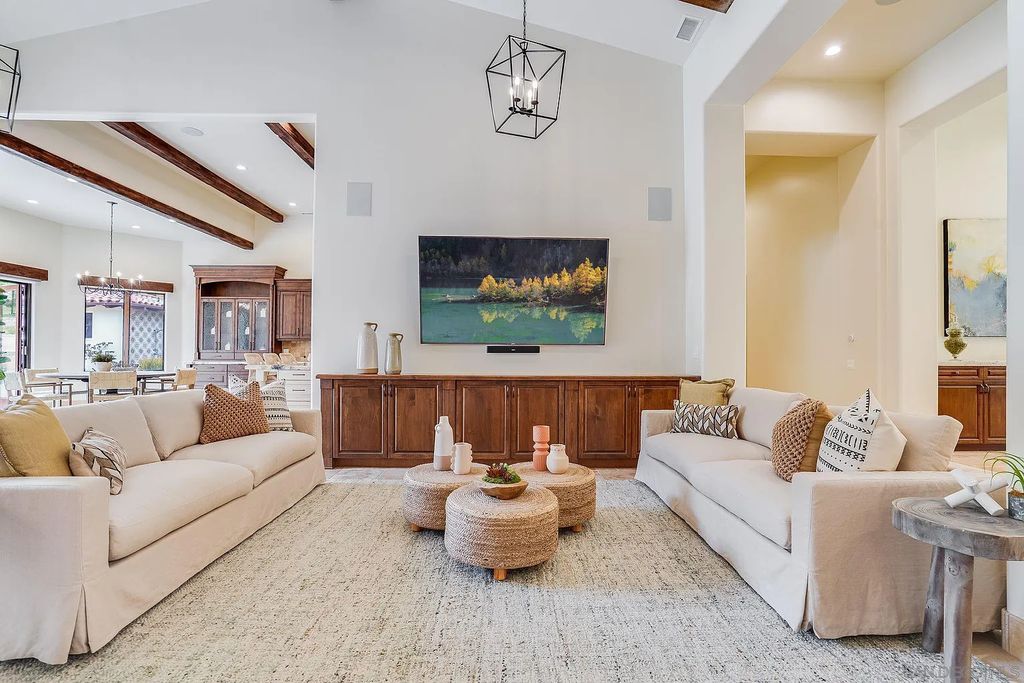 16109 Rambla De Las Flores Home in Rancho Santa Fe, California. The property is situated on 2.7 acres of land and features a detached guest house with a kitchen, as well as a master retreat with a private patio overlooking the pool, spa, and grounds. 