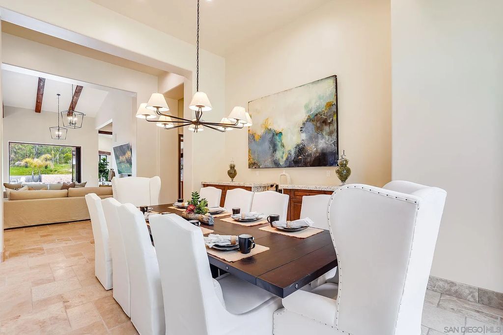 16109 Rambla De Las Flores Home in Rancho Santa Fe, California. The property is situated on 2.7 acres of land and features a detached guest house with a kitchen, as well as a master retreat with a private patio overlooking the pool, spa, and grounds. 