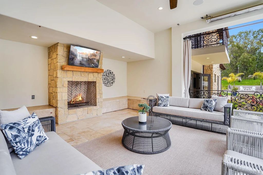 16109 Rambla De Las Flores Home in Rancho Santa Fe, California. The property is situated on 2.7 acres of land and features a detached guest house with a kitchen, as well as a master retreat with a private patio overlooking the pool, spa, and grounds. 