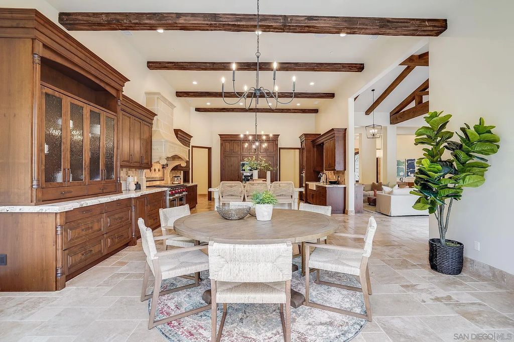 16109 Rambla De Las Flores Home in Rancho Santa Fe, California. The property is situated on 2.7 acres of land and features a detached guest house with a kitchen, as well as a master retreat with a private patio overlooking the pool, spa, and grounds. 