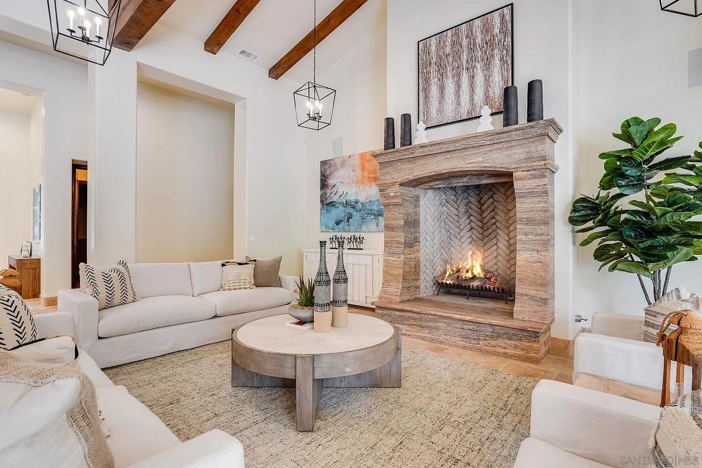 16109 Rambla De Las Flores Home in Rancho Santa Fe, California. The property is situated on 2.7 acres of land and features a detached guest house with a kitchen, as well as a master retreat with a private patio overlooking the pool, spa, and grounds. 