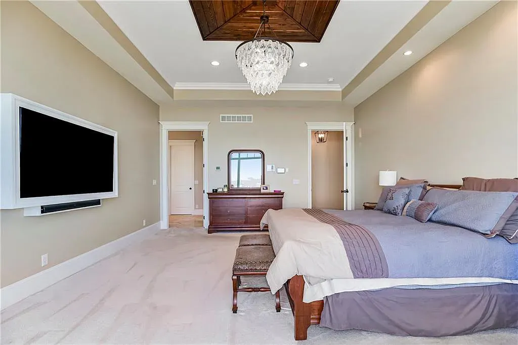 18111 Melrose Drive Home in Overland Park, Kansas. Stunning estate property situated on nearly 8 acres in the coveted Wolf Valley. With over 7600 square feet of living space and an astounding 12 garage spaces, this property offers everything you could ever need.