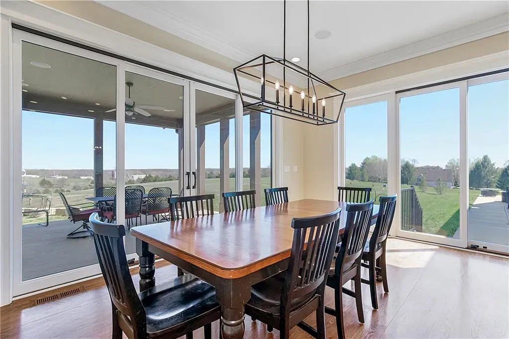 18111 Melrose Drive Home in Overland Park, Kansas. Stunning estate property situated on nearly 8 acres in the coveted Wolf Valley. With over 7600 square feet of living space and an astounding 12 garage spaces, this property offers everything you could ever need.