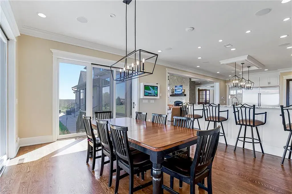 18111 Melrose Drive Home in Overland Park, Kansas. Stunning estate property situated on nearly 8 acres in the coveted Wolf Valley. With over 7600 square feet of living space and an astounding 12 garage spaces, this property offers everything you could ever need.