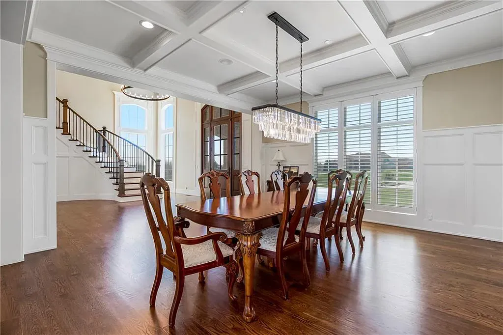 18111 Melrose Drive Home in Overland Park, Kansas. Stunning estate property situated on nearly 8 acres in the coveted Wolf Valley. With over 7600 square feet of living space and an astounding 12 garage spaces, this property offers everything you could ever need.