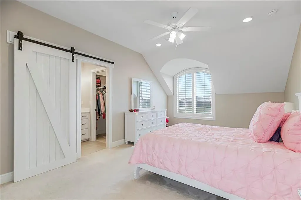 18111 Melrose Drive Home in Overland Park, Kansas. Stunning estate property situated on nearly 8 acres in the coveted Wolf Valley. With over 7600 square feet of living space and an astounding 12 garage spaces, this property offers everything you could ever need.
