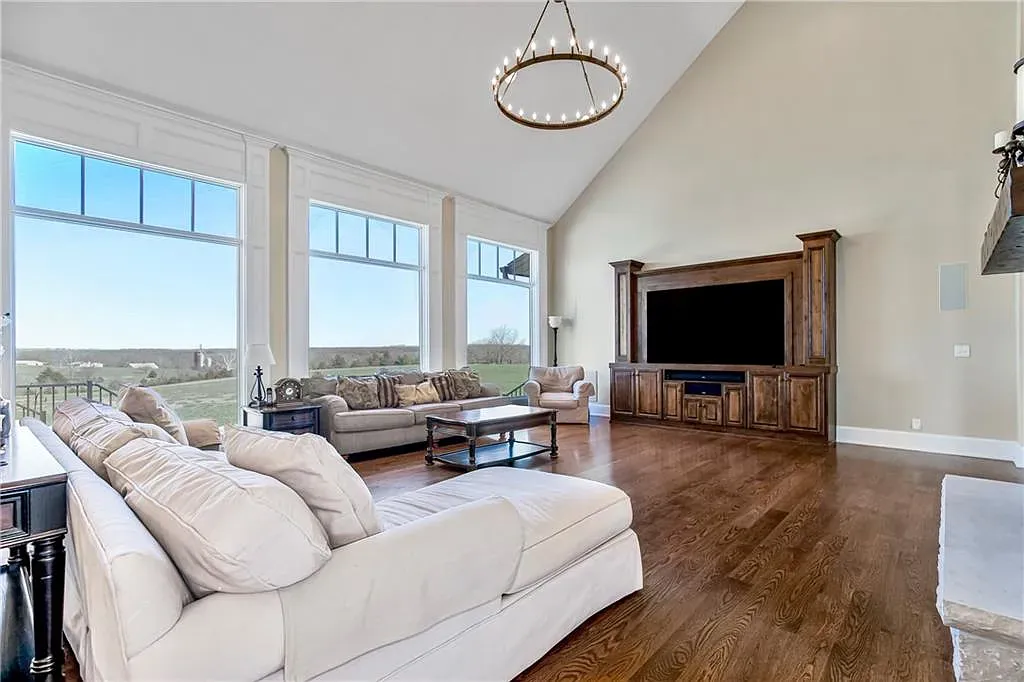 18111 Melrose Drive Home in Overland Park, Kansas. Stunning estate property situated on nearly 8 acres in the coveted Wolf Valley. With over 7600 square feet of living space and an astounding 12 garage spaces, this property offers everything you could ever need.