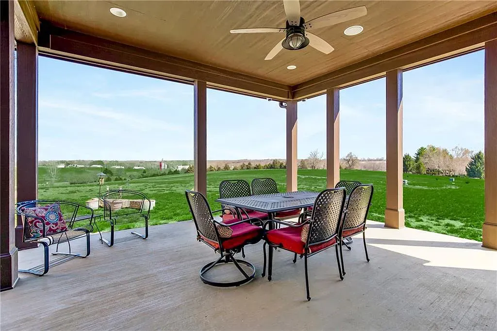 18111 Melrose Drive Home in Overland Park, Kansas. Stunning estate property situated on nearly 8 acres in the coveted Wolf Valley. With over 7600 square feet of living space and an astounding 12 garage spaces, this property offers everything you could ever need.