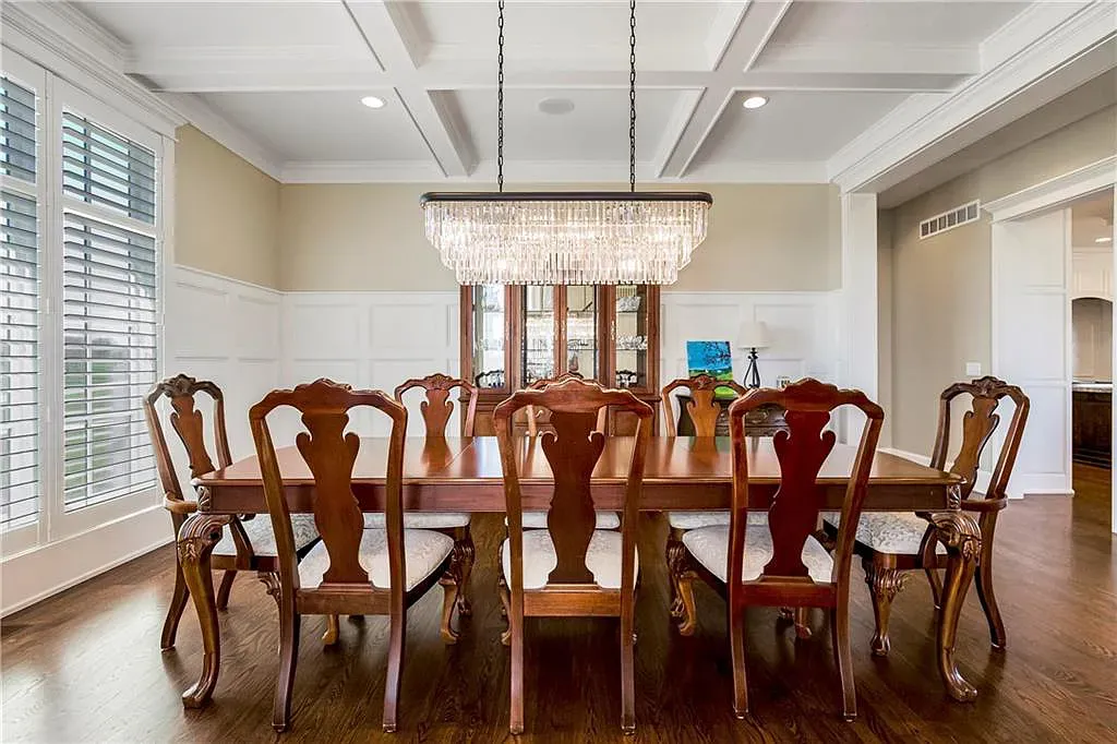 18111 Melrose Drive Home in Overland Park, Kansas. Stunning estate property situated on nearly 8 acres in the coveted Wolf Valley. With over 7600 square feet of living space and an astounding 12 garage spaces, this property offers everything you could ever need.