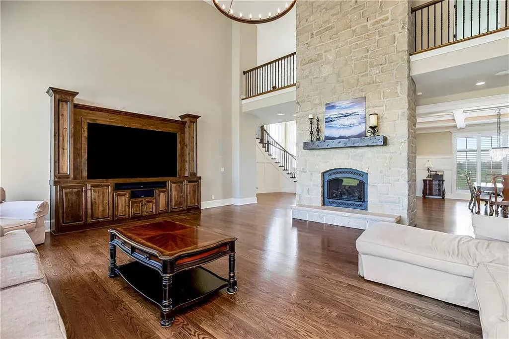 18111 Melrose Drive Home in Overland Park, Kansas. Stunning estate property situated on nearly 8 acres in the coveted Wolf Valley. With over 7600 square feet of living space and an astounding 12 garage spaces, this property offers everything you could ever need.
