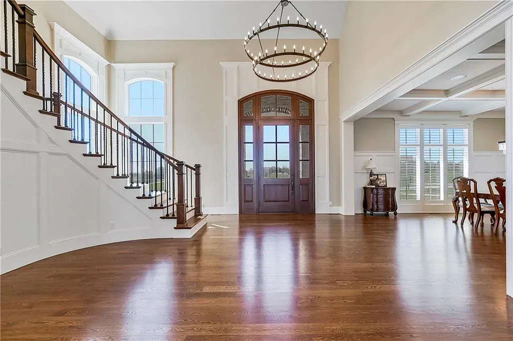 18111 Melrose Drive Home in Overland Park, Kansas. Stunning estate property situated on nearly 8 acres in the coveted Wolf Valley. With over 7600 square feet of living space and an astounding 12 garage spaces, this property offers everything you could ever need.