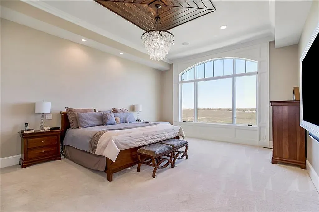 18111 Melrose Drive Home in Overland Park, Kansas. Stunning estate property situated on nearly 8 acres in the coveted Wolf Valley. With over 7600 square feet of living space and an astounding 12 garage spaces, this property offers everything you could ever need.