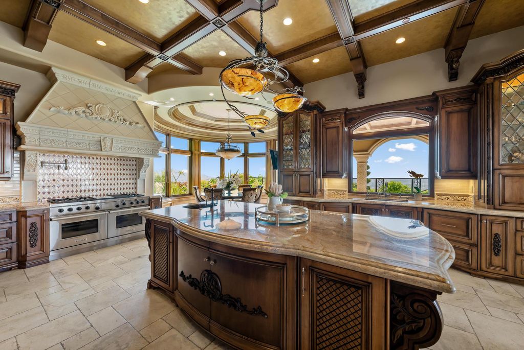 1903 Saxton Lane Home in El Cajon, California. Discover unparalleled luxury living in this custom-built, handcrafted mountaintop estate with unobstructed views. Designed by renowned architect John Jensen AIA and built by Tony Mezain AME Proline Inc, this 13,631 sqft retreat features 5 bedrooms, 9 bathrooms, and exquisite attention to detail. 