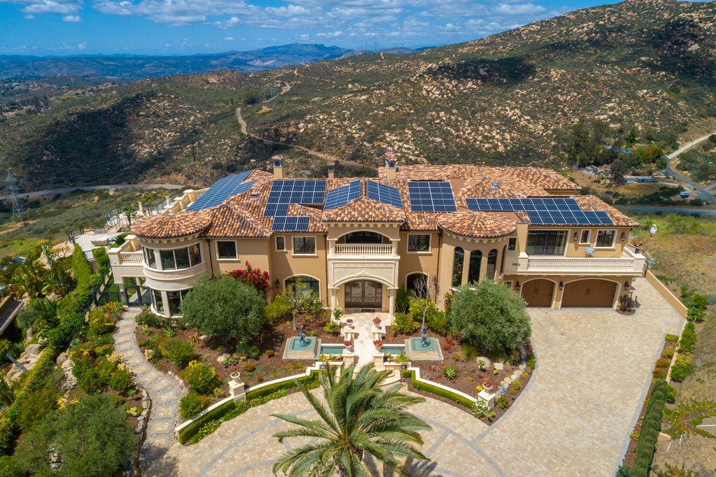 1903 Saxton Lane Home in El Cajon, California. Discover unparalleled luxury living in this custom-built, handcrafted mountaintop estate with unobstructed views. Designed by renowned architect John Jensen AIA and built by Tony Mezain AME Proline Inc, this 13,631 sqft retreat features 5 bedrooms, 9 bathrooms, and exquisite attention to detail. 