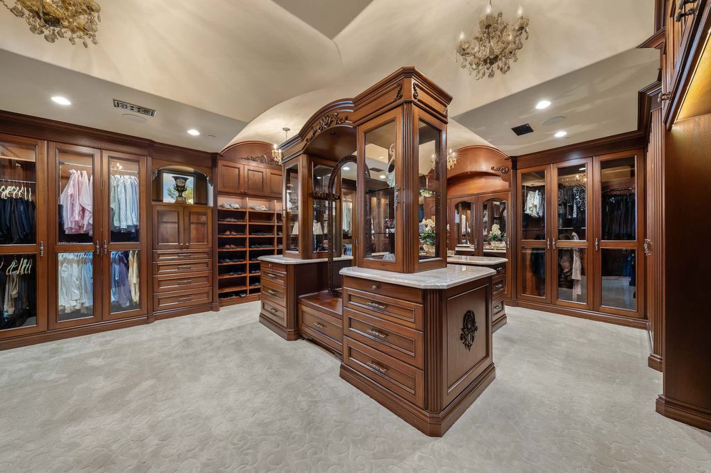 1903 Saxton Lane Home in El Cajon, California. Discover unparalleled luxury living in this custom-built, handcrafted mountaintop estate with unobstructed views. Designed by renowned architect John Jensen AIA and built by Tony Mezain AME Proline Inc, this 13,631 sqft retreat features 5 bedrooms, 9 bathrooms, and exquisite attention to detail. 