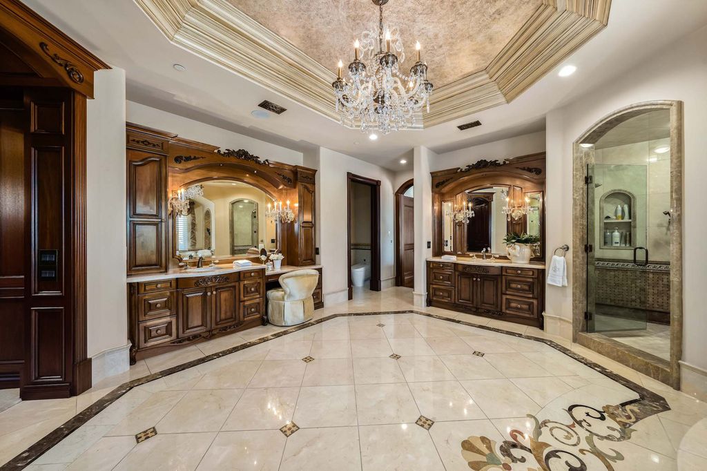 1903 Saxton Lane Home in El Cajon, California. Discover unparalleled luxury living in this custom-built, handcrafted mountaintop estate with unobstructed views. Designed by renowned architect John Jensen AIA and built by Tony Mezain AME Proline Inc, this 13,631 sqft retreat features 5 bedrooms, 9 bathrooms, and exquisite attention to detail. 