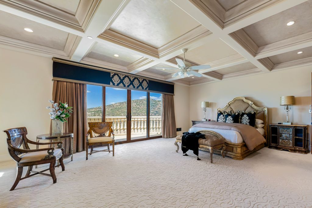 1903 Saxton Lane Home in El Cajon, California. Discover unparalleled luxury living in this custom-built, handcrafted mountaintop estate with unobstructed views. Designed by renowned architect John Jensen AIA and built by Tony Mezain AME Proline Inc, this 13,631 sqft retreat features 5 bedrooms, 9 bathrooms, and exquisite attention to detail. 