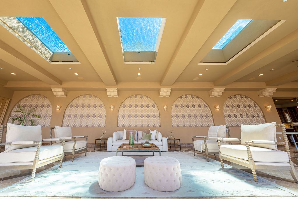 1903 Saxton Lane Home in El Cajon, California. Discover unparalleled luxury living in this custom-built, handcrafted mountaintop estate with unobstructed views. Designed by renowned architect John Jensen AIA and built by Tony Mezain AME Proline Inc, this 13,631 sqft retreat features 5 bedrooms, 9 bathrooms, and exquisite attention to detail. 