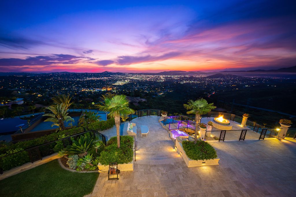 1903 Saxton Lane Home in El Cajon, California. Discover unparalleled luxury living in this custom-built, handcrafted mountaintop estate with unobstructed views. Designed by renowned architect John Jensen AIA and built by Tony Mezain AME Proline Inc, this 13,631 sqft retreat features 5 bedrooms, 9 bathrooms, and exquisite attention to detail. 