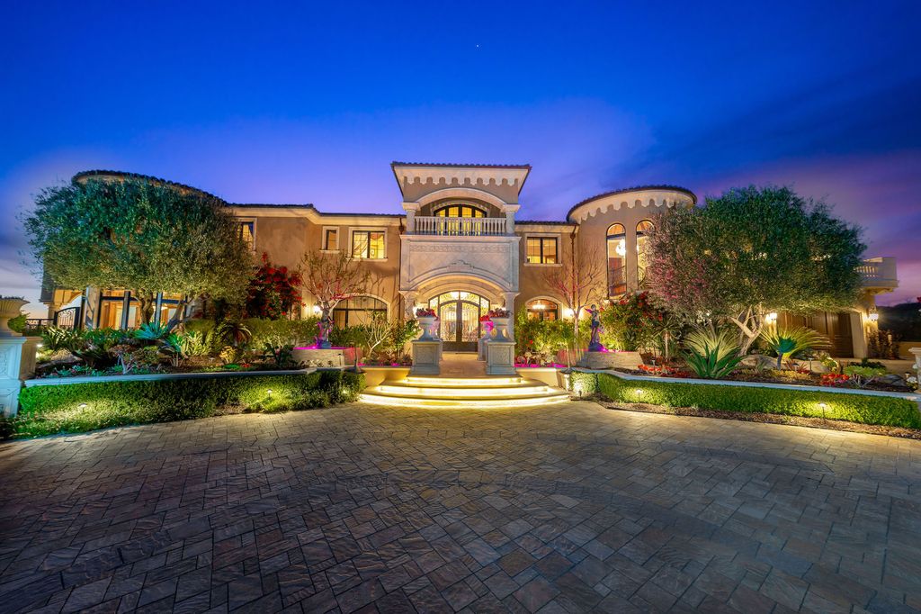 1903 Saxton Lane Home in El Cajon, California. Discover unparalleled luxury living in this custom-built, handcrafted mountaintop estate with unobstructed views. Designed by renowned architect John Jensen AIA and built by Tony Mezain AME Proline Inc, this 13,631 sqft retreat features 5 bedrooms, 9 bathrooms, and exquisite attention to detail. 