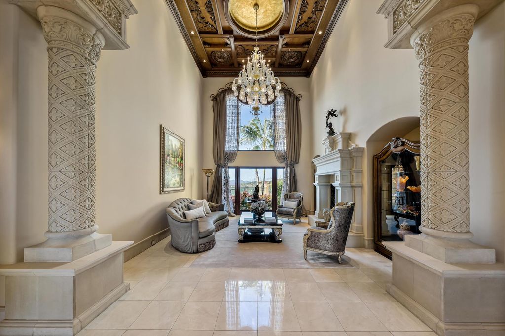 1903 Saxton Lane Home in El Cajon, California. Discover unparalleled luxury living in this custom-built, handcrafted mountaintop estate with unobstructed views. Designed by renowned architect John Jensen AIA and built by Tony Mezain AME Proline Inc, this 13,631 sqft retreat features 5 bedrooms, 9 bathrooms, and exquisite attention to detail. 