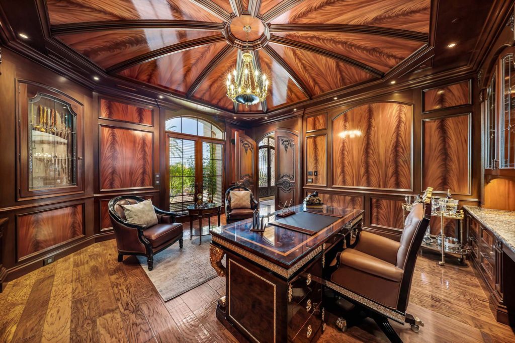 1903 Saxton Lane Home in El Cajon, California. Discover unparalleled luxury living in this custom-built, handcrafted mountaintop estate with unobstructed views. Designed by renowned architect John Jensen AIA and built by Tony Mezain AME Proline Inc, this 13,631 sqft retreat features 5 bedrooms, 9 bathrooms, and exquisite attention to detail. 