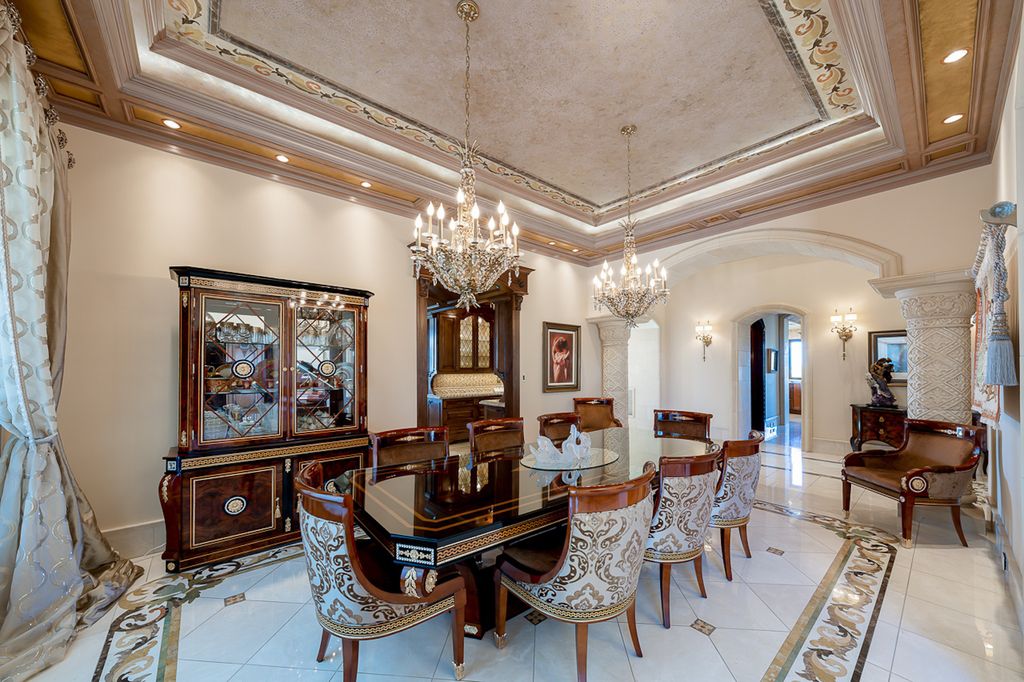 1903 Saxton Lane Home in El Cajon, California. Discover unparalleled luxury living in this custom-built, handcrafted mountaintop estate with unobstructed views. Designed by renowned architect John Jensen AIA and built by Tony Mezain AME Proline Inc, this 13,631 sqft retreat features 5 bedrooms, 9 bathrooms, and exquisite attention to detail. 