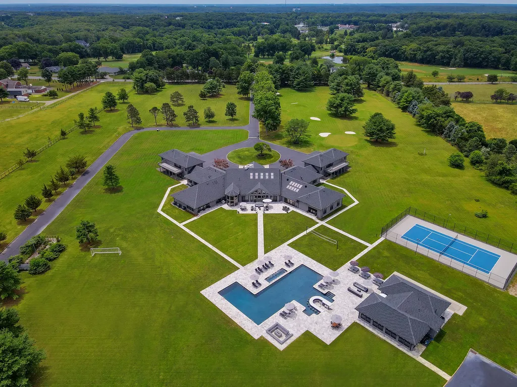 1980 Campbell Road Home in Wall, New Jersey. Experience the epitome of luxury living at Mattaccino, a remarkable 23.44 acre residential resort that surpasses all expectations. Discover a sprawling 32,500 square-foot compound, featuring an impressive array of amenities, including 10+ bedrooms, 17 bathrooms, a four-hole golf course, equestrian stables, an ultra-chic underground nightclub, and an indoor pool and spa.