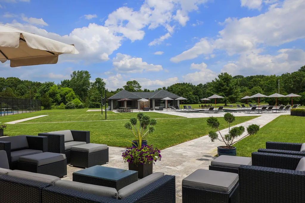 1980 Campbell Road Home in Wall, New Jersey. Experience the epitome of luxury living at Mattaccino, a remarkable 23.44 acre residential resort that surpasses all expectations. Discover a sprawling 32,500 square-foot compound, featuring an impressive array of amenities, including 10+ bedrooms, 17 bathrooms, a four-hole golf course, equestrian stables, an ultra-chic underground nightclub, and an indoor pool and spa.