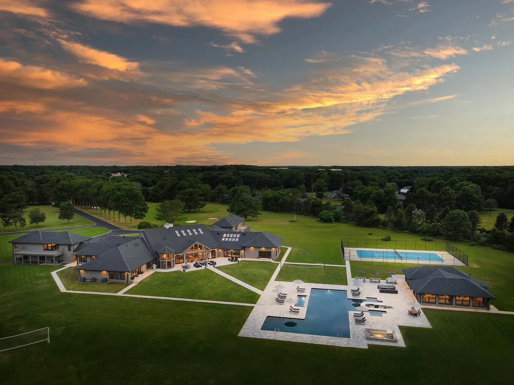 1980 Campbell Road Home in Wall, New Jersey. Experience the epitome of luxury living at Mattaccino, a remarkable 23.44 acre residential resort that surpasses all expectations. Discover a sprawling 32,500 square-foot compound, featuring an impressive array of amenities, including 10+ bedrooms, 17 bathrooms, a four-hole golf course, equestrian stables, an ultra-chic underground nightclub, and an indoor pool and spa.