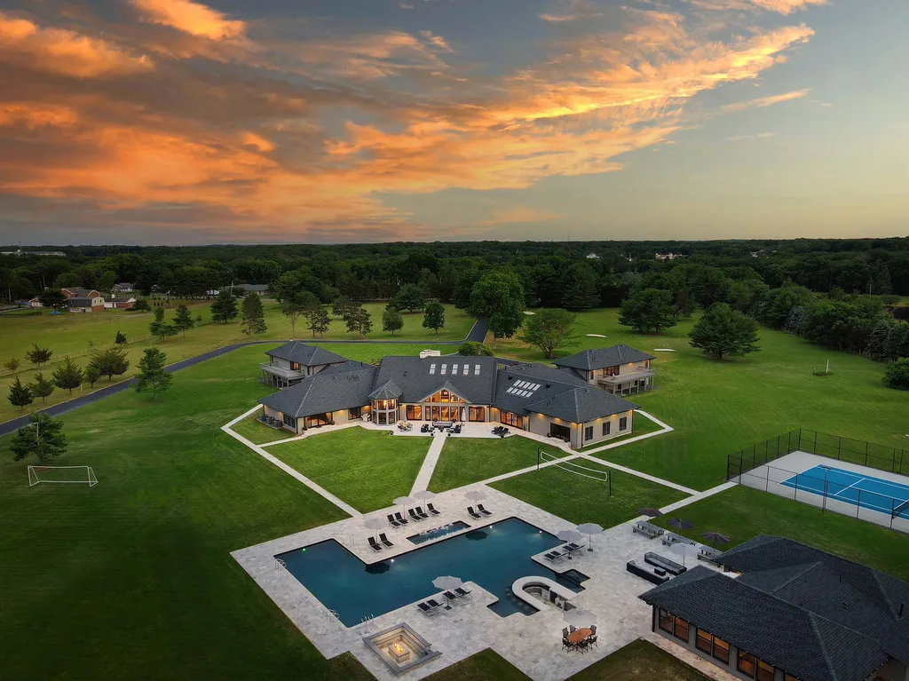 1980 Campbell Road Home in Wall, New Jersey. Experience the epitome of luxury living at Mattaccino, a remarkable 23.44 acre residential resort that surpasses all expectations. Discover a sprawling 32,500 square-foot compound, featuring an impressive array of amenities, including 10+ bedrooms, 17 bathrooms, a four-hole golf course, equestrian stables, an ultra-chic underground nightclub, and an indoor pool and spa.