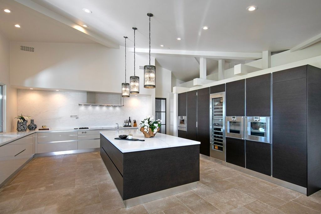 2170 Ortega Ranch Lane Home in Santa Barbara, California. Unwind in the lap of luxury at this newly renovated, single-level estate boasting breathtaking panoramic views that stretch across the horizon. Step inside to discover a world of elegance, where gracious rooms and covered terraces seamlessly connect with the awe-inspiring vistas. Designed for both entertainment and relaxation, this extraordinary home offers a harmonious blend of public and private spaces.