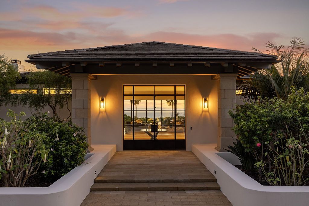 2170 Ortega Ranch Lane Home in Santa Barbara, California. Unwind in the lap of luxury at this newly renovated, single-level estate boasting breathtaking panoramic views that stretch across the horizon. Step inside to discover a world of elegance, where gracious rooms and covered terraces seamlessly connect with the awe-inspiring vistas. Designed for both entertainment and relaxation, this extraordinary home offers a harmonious blend of public and private spaces.
