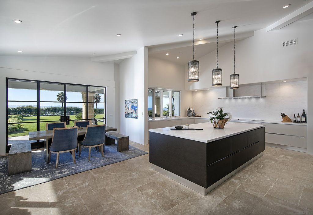 2170 Ortega Ranch Lane Home in Santa Barbara, California. Unwind in the lap of luxury at this newly renovated, single-level estate boasting breathtaking panoramic views that stretch across the horizon. Step inside to discover a world of elegance, where gracious rooms and covered terraces seamlessly connect with the awe-inspiring vistas. Designed for both entertainment and relaxation, this extraordinary home offers a harmonious blend of public and private spaces.