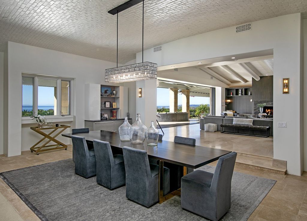 2170 Ortega Ranch Lane Home in Santa Barbara, California. Unwind in the lap of luxury at this newly renovated, single-level estate boasting breathtaking panoramic views that stretch across the horizon. Step inside to discover a world of elegance, where gracious rooms and covered terraces seamlessly connect with the awe-inspiring vistas. Designed for both entertainment and relaxation, this extraordinary home offers a harmonious blend of public and private spaces.