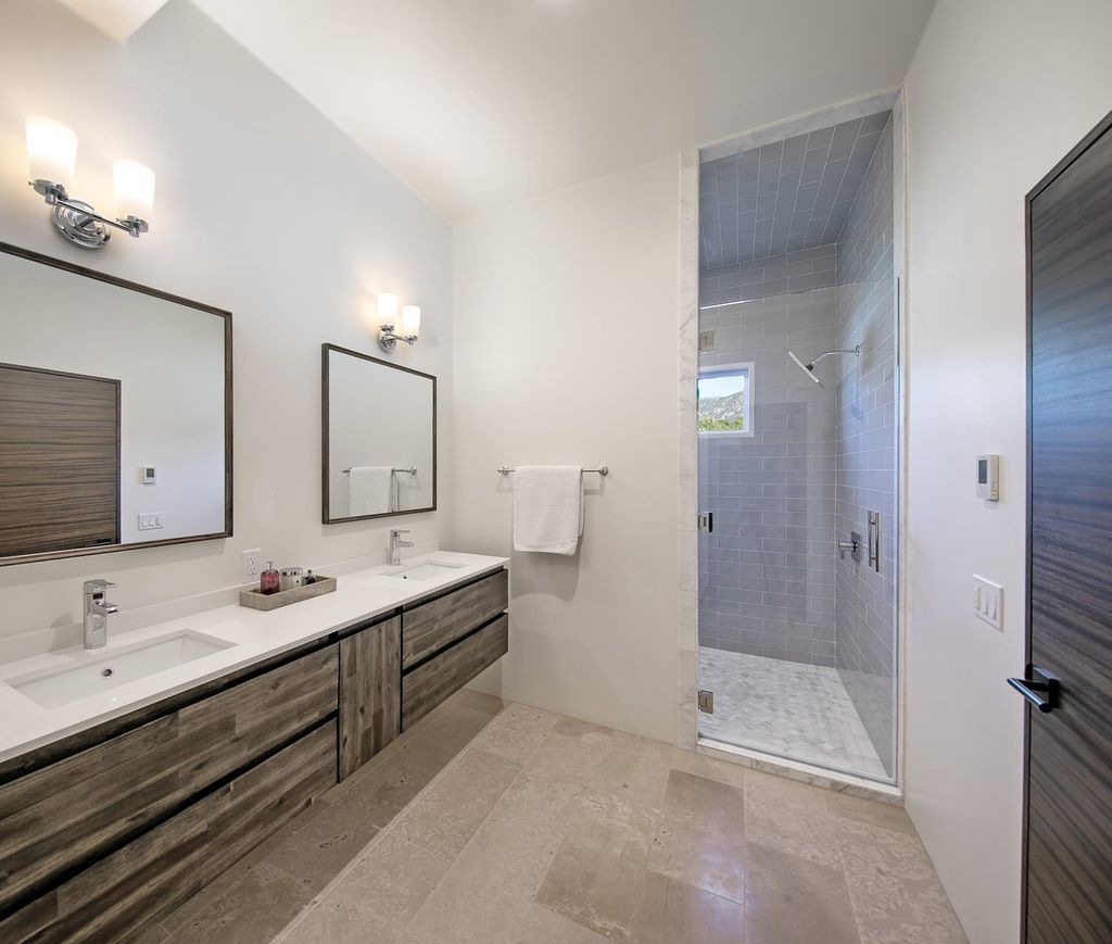2170 Ortega Ranch Lane Home in Santa Barbara, California. Unwind in the lap of luxury at this newly renovated, single-level estate boasting breathtaking panoramic views that stretch across the horizon. Step inside to discover a world of elegance, where gracious rooms and covered terraces seamlessly connect with the awe-inspiring vistas. Designed for both entertainment and relaxation, this extraordinary home offers a harmonious blend of public and private spaces.