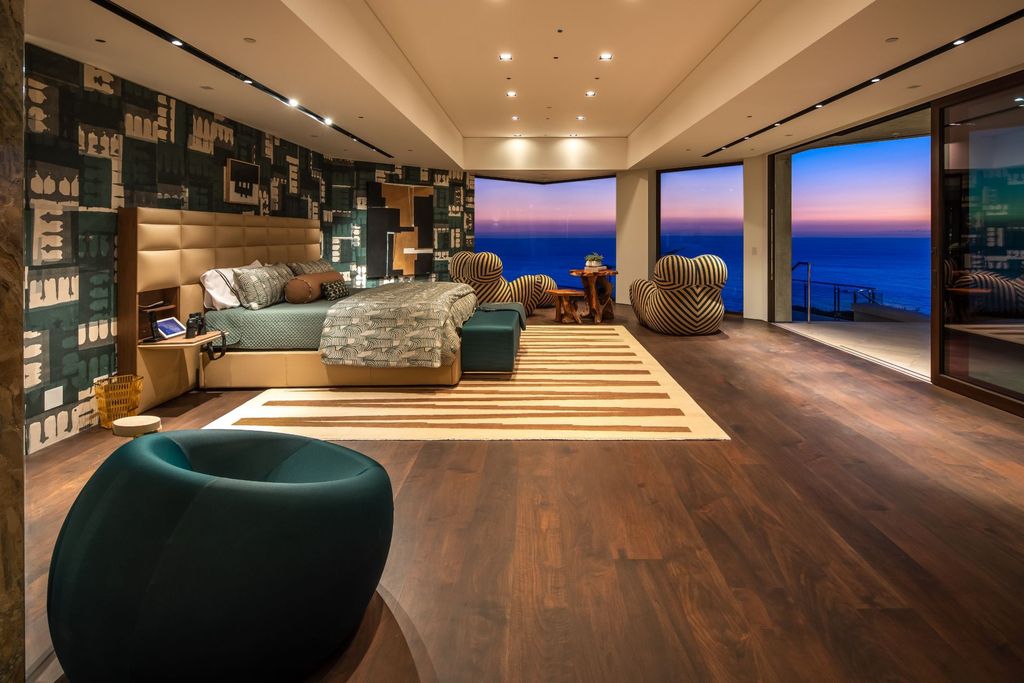 31401 Mar Vista Avenue Home in Laguna Beach, California. Located just minutes away from the prestigious Montage Laguna Beach resort, this unparalleled estate is situated in Southern California, offering stunning views of the Pacific Ocean and access to secluded beaches. Spread across 12 acres of native California landscape, this thoughtfully constructed property showcases exquisite design, abundant natural light, and a seamless integration with the surrounding environment.