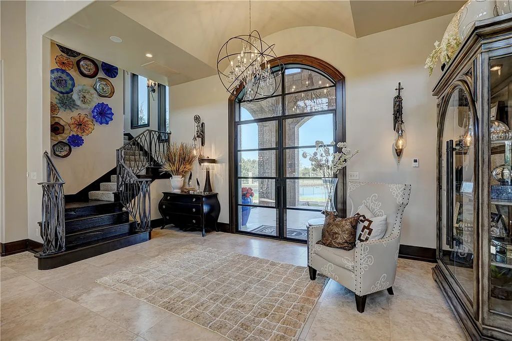 3507 Hillview Drive Home in Drive, Norman, Oklahoma. The home boasts picturesque views from the moment you approach it. Some of its exceptional features include a massive, aerated, and stocked pond that holds approximately 1 million gallons of water, premium finishes and appliances throughout, travertine flooring, two laundry rooms, rare and unique granite, 10-foot garage doors, a hydraulic elevator, spray foam insulation, automatic lighting in every closet, and a hot water recirculating system.