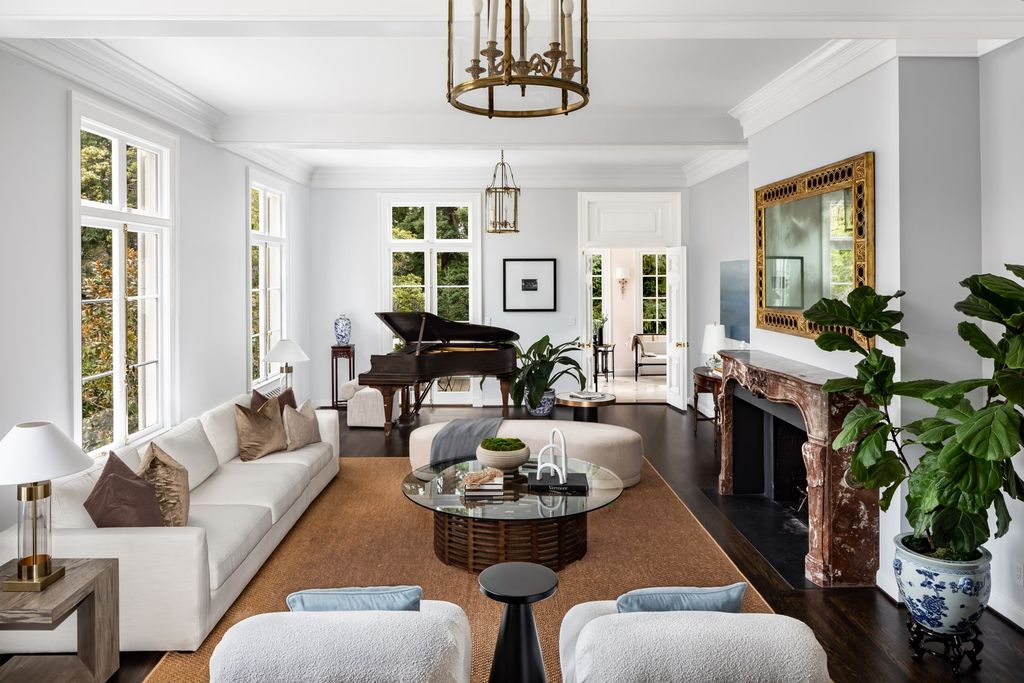 395 Hampton Road Home in Piedmont, California. The property has been expertly modernized while still maintaining its elegant provenance, with features such as custom cabinetry, marble countertops, and premium fixtures and appliances. The house boasts a newly renovated and expanded kitchen, formal living and dining rooms, and sweeping outdoor patios. 
