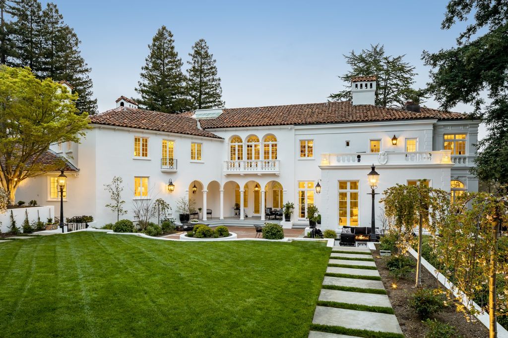 395 Hampton Road Home in Piedmont, California. The property has been expertly modernized while still maintaining its elegant provenance, with features such as custom cabinetry, marble countertops, and premium fixtures and appliances. The house boasts a newly renovated and expanded kitchen, formal living and dining rooms, and sweeping outdoor patios. 