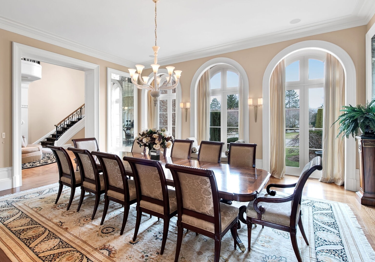 4 Stone Tower Drive Home in Alpine, New Jersey. Discover the epitome of luxury living at the majestic Alpine estate, one of the finest homes in Northern Bergen County. Set on 4 gated manicured acres in Rio Vista, this impeccably designed manor by James Paragono showcases architectural excellence and meticulous craftsmanship. With 22,782 square feet of opulent living space spread across 4 levels, this estate boasts 12' ceilings, luxurious amenities, and breathtaking features, including a pool, cabana, tennis court, guest house, and putting green. The residence offers garage parking for 8 cars, an elevator servicing all floors, 25 rooms, a new Salerno kitchen, 8 bedrooms, 9 full and 3 half baths, bowling alleys, a home theater, a commercial generator, and state-of-the-art high-efficiency furnaces.