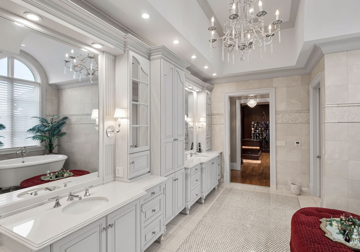 4 Stone Tower Drive Home in Alpine, New Jersey. Discover the epitome of luxury living at the majestic Alpine estate, one of the finest homes in Northern Bergen County. Set on 4 gated manicured acres in Rio Vista, this impeccably designed manor by James Paragono showcases architectural excellence and meticulous craftsmanship. With 22,782 square feet of opulent living space spread across 4 levels, this estate boasts 12' ceilings, luxurious amenities, and breathtaking features, including a pool, cabana, tennis court, guest house, and putting green. The residence offers garage parking for 8 cars, an elevator servicing all floors, 25 rooms, a new Salerno kitchen, 8 bedrooms, 9 full and 3 half baths, bowling alleys, a home theater, a commercial generator, and state-of-the-art high-efficiency furnaces.