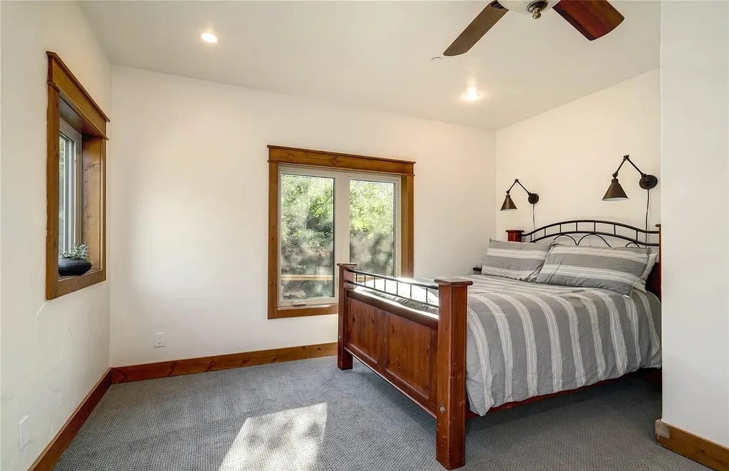 45200 Diamondback Way Home in Steamboat Springs, Colorado. Escape to a tranquil mountain retreat on Diamondback Way, offering breathtaking views and complete privacy just minutes from downtown Steamboat. This expansive property boasts 40 acres, hiking trails, and outdoor living spaces. The home features a great room with vaulted ceilings, a central kitchen for entertaining, and 6 bedrooms including primary suites. Enjoy the outdoors with a fire pit, hot tub, and acres of land for recreation. Horses are welcome, and the property has a high-producing well. Embrace the beauty of Steamboat's natural surroundings at this remarkable retreat.