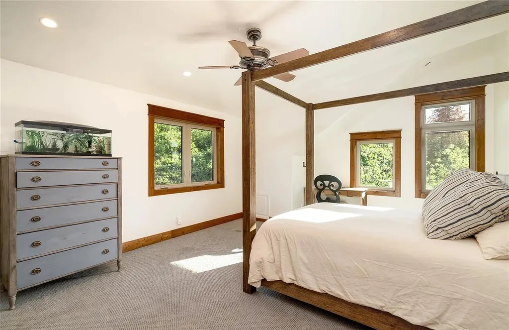 45200 Diamondback Way Home in Steamboat Springs, Colorado. Escape to a tranquil mountain retreat on Diamondback Way, offering breathtaking views and complete privacy just minutes from downtown Steamboat. This expansive property boasts 40 acres, hiking trails, and outdoor living spaces. The home features a great room with vaulted ceilings, a central kitchen for entertaining, and 6 bedrooms including primary suites. Enjoy the outdoors with a fire pit, hot tub, and acres of land for recreation. Horses are welcome, and the property has a high-producing well. Embrace the beauty of Steamboat's natural surroundings at this remarkable retreat.