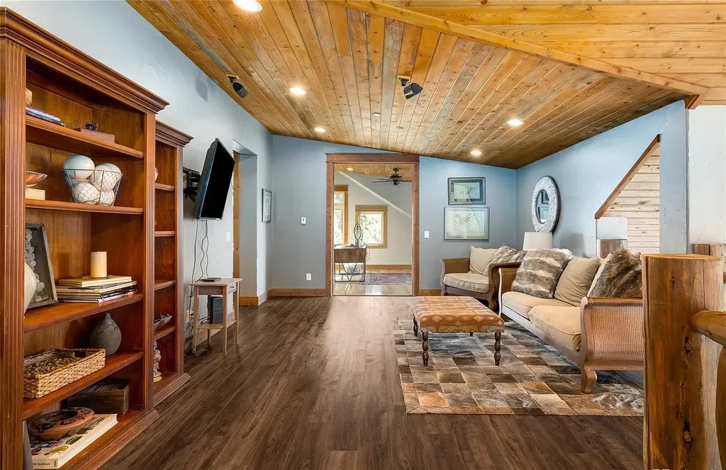 45200 Diamondback Way Home in Steamboat Springs, Colorado. Escape to a tranquil mountain retreat on Diamondback Way, offering breathtaking views and complete privacy just minutes from downtown Steamboat. This expansive property boasts 40 acres, hiking trails, and outdoor living spaces. The home features a great room with vaulted ceilings, a central kitchen for entertaining, and 6 bedrooms including primary suites. Enjoy the outdoors with a fire pit, hot tub, and acres of land for recreation. Horses are welcome, and the property has a high-producing well. Embrace the beauty of Steamboat's natural surroundings at this remarkable retreat.